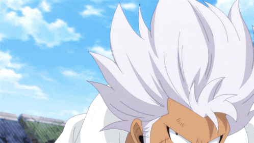 a man with white hair and a black tattoo on his arm