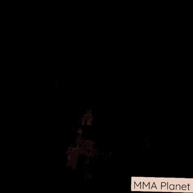 a bunch of rugs are stacked on top of each other with a mma planet logo in the corner