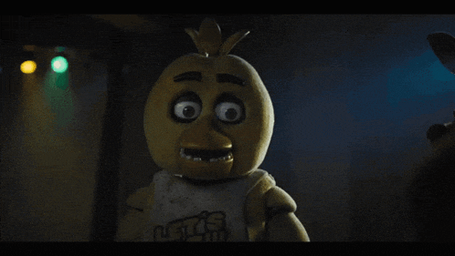 chica from five nights at freddy 's is wearing a shirt that says let 's eat