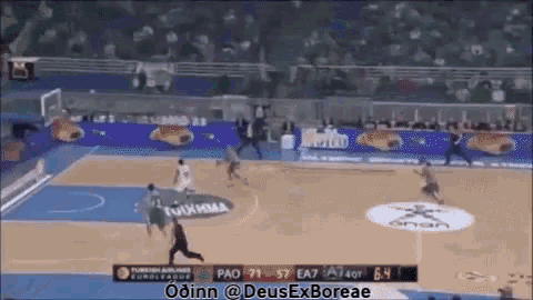 a basketball game is being played in a stadium with advertisements for turkish airlines and deus ex boreae