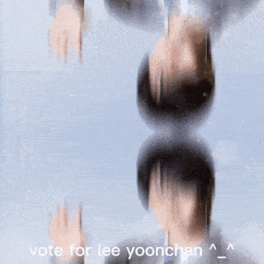 a blurry picture of a man in a suit and tie with the words vote for lee yoonchan