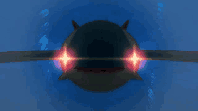 a shark is swimming in the ocean with two red lights coming out of its eyes