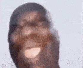 a blurry picture of a person 's face behind a glass