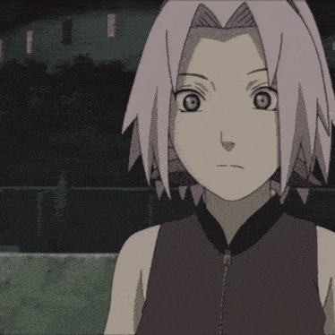 a cartoon girl with pink hair and green eyes smiles