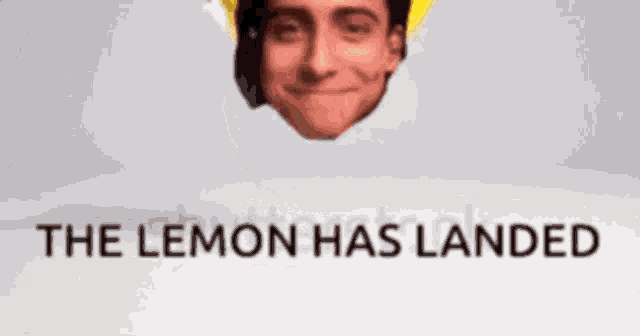 a picture of a man 's face with the words `` the lemon has landed '' written below it .