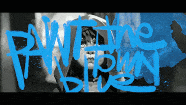 a black and white photo of a woman with the words paw the town blue written in blue