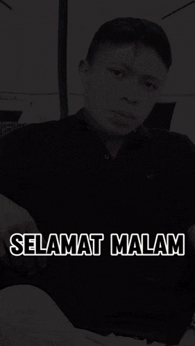 a black and white photo of a man with the words selamat malam written below him