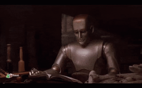 Trecho do filme "O Homem Bicentenário" em que o robô Andrew está lendo um livro.