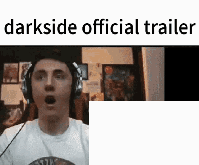 a man wearing headphones with his mouth open and the words darkside official trailer