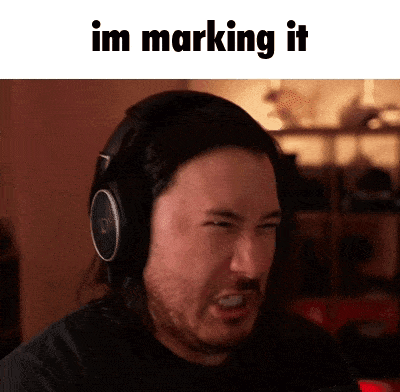 a man wearing headphones is making a funny face and the words im marking it are above him