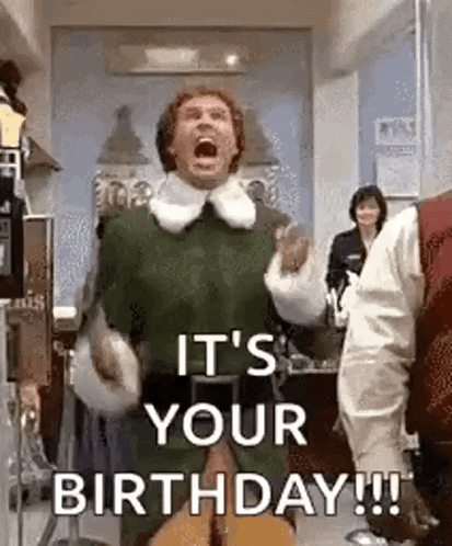 a man in an elf costume is screaming and holding a guitar .