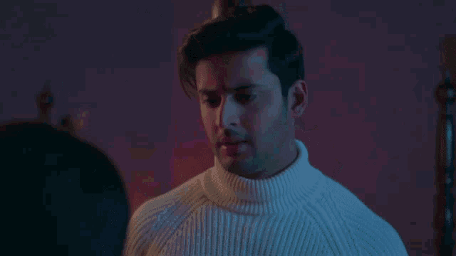 a woman in a red shirt is looking at a man in a white shirt and says main hamesha teri saath rahungi