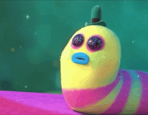 a colorful stuffed animal with a top hat on it