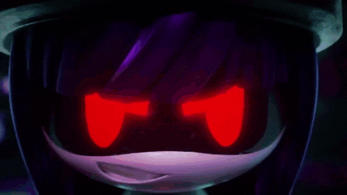 a close up of a cartoon character wearing a mask with red lights coming out of it 's eyes .