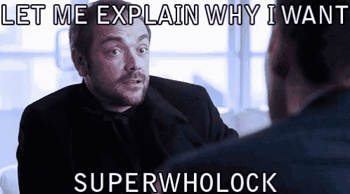 a man in a suit and tie is talking to another man in a room .