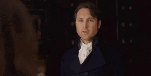 a man in a tuxedo with the words you 're a remarkable young woman behind him