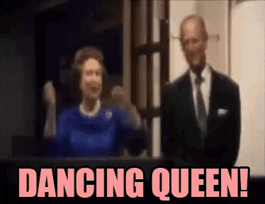 a blurry picture of a man and woman with the words dancing queen