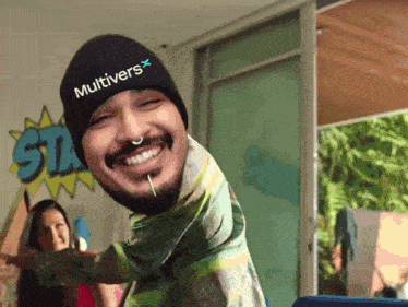 a man wearing a beanie that says multiversx