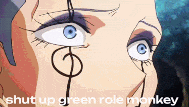 a close up of a woman 's face with the words shut up green role monkey written below her