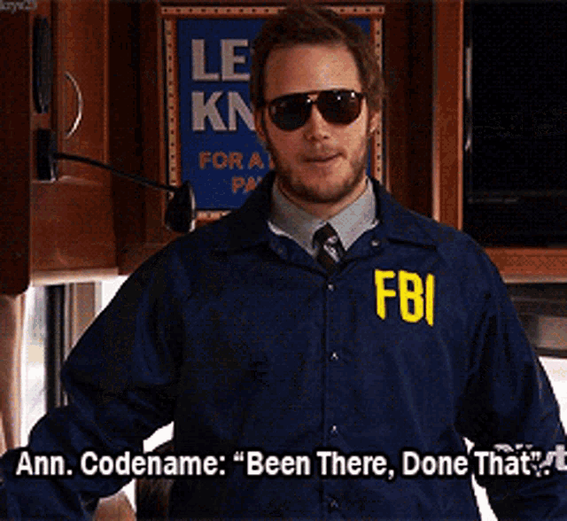 a man wearing sunglasses and a fbi jacket says ann codename " been there done that "