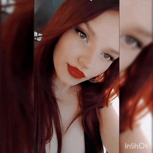 a close up of a woman 's face with red hair and red lipstick
