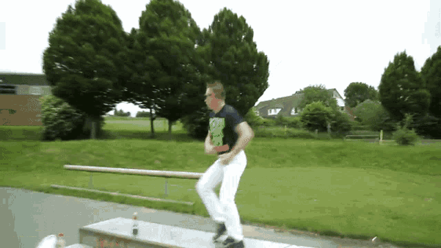 a man wearing a t-shirt that says ' x-men ' on it