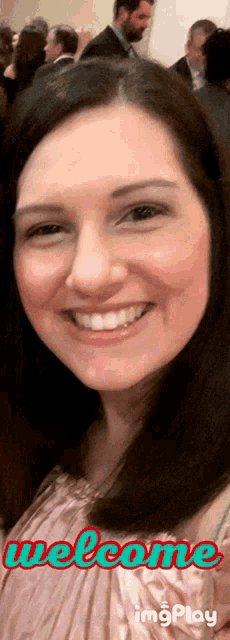 a woman is smiling with the words welcome imgplay behind her