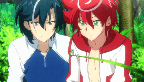 two anime characters with red hair and green eyes