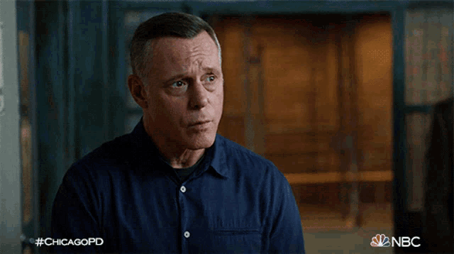 a man in a blue shirt with the hashtag #chicagopd