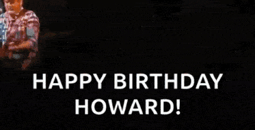 a man in a blue shirt is dancing on a stage and says happy birthday howard