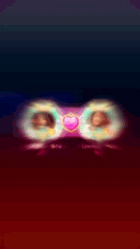 a blurred image of a person 's face with a pink circle in the middle