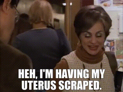a woman is talking to a man and says heh i 'm having my uterus scraped