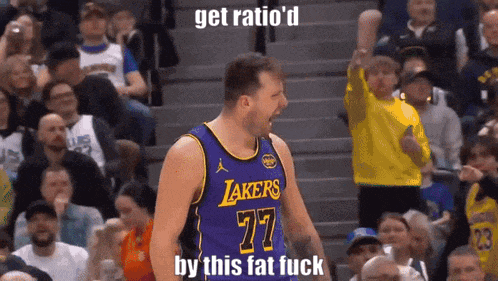 a basketball player wearing a lakers jersey celebrates