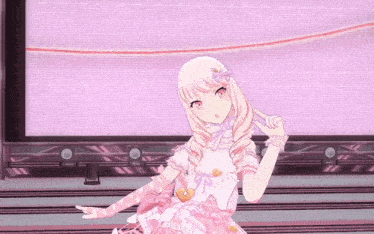a girl in a pink dress and gloves is standing on a stage .