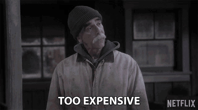 a man with a mustache and a beanie says too expensive