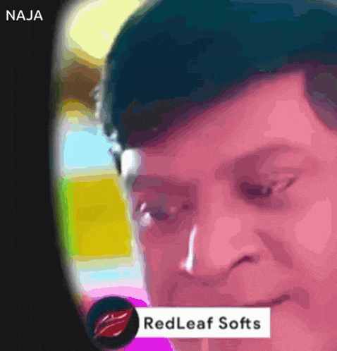 a picture of a man with a red leaf softs logo