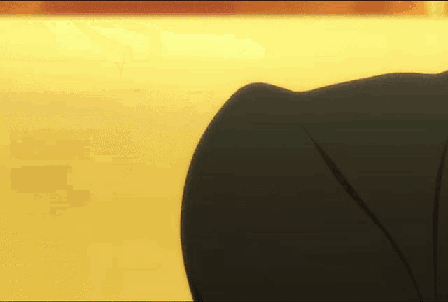 a close up of a person 's arm with a yellow background