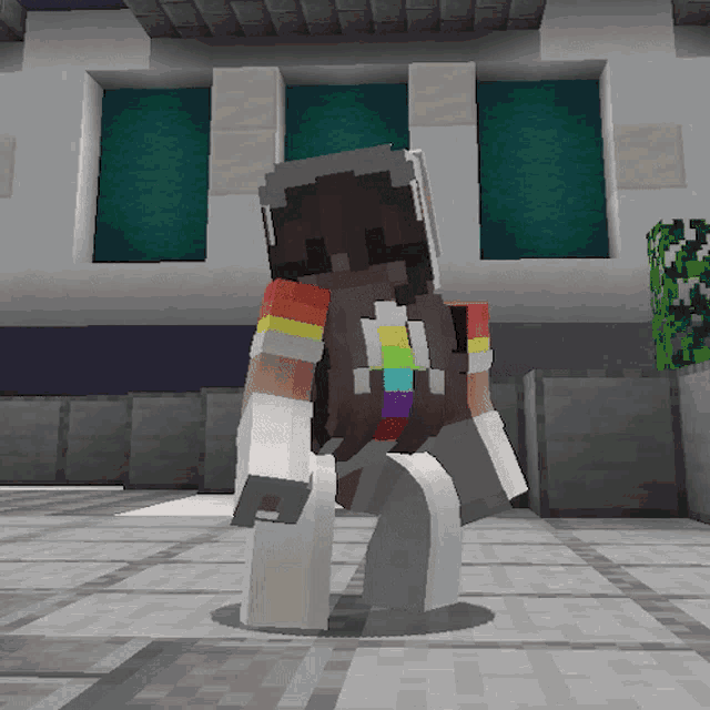 a minecraft character with a rainbow colored shirt