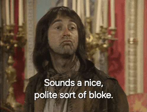 a man with long hair says " sounds a nice polite sort of bloke " in front of candles