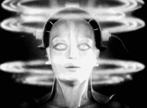 a black and white photo of a woman 's face with a robotic head and headphones .
