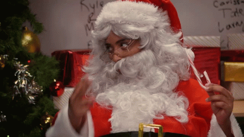 Keeping My Eye On You Mr Claus GIF - Keeping My Eye On You Mr Claus Lilly Singh GIFs