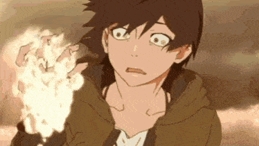 a close up of a person holding a fireball in their hand in a cartoon .