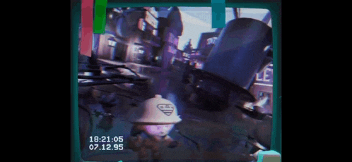a video of a man in a top hat with the time of 18:21 on the bottom