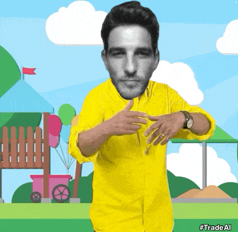 a man in a yellow shirt is giving a peace sign in front of a playground