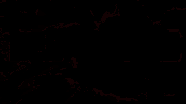 a red and black background with a white letter v