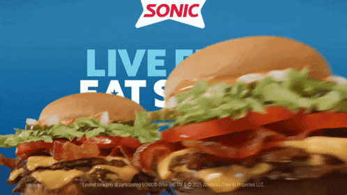 a sonic advertisement shows two hamburgers with lettuce tomatoes and bacon