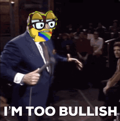 a man in a suit and tie is holding a microphone and says " i 'm too bullish "