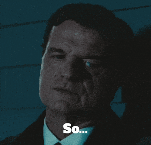 a man in a suit and tie is asking if he 's like a nurse or something