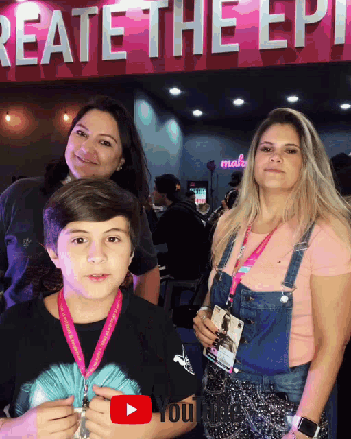 a group of people standing in front of a sign that says " create the epi "