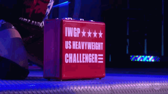 a red case that says iwgp us heavyweight challenger on it